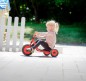 Preview: Kleinkind fährt das Winther Mini Viking Easy Rider vor einem Zaun