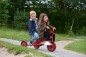 Preview: Winther Viking Dreirad Taxi mit Fahrerin und Mitfahrer auf einem Parkweg