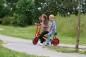 Preview: Winther Viking Laufrad Tandem BikeRunner mit zwei Kindern auf einem Parkweg